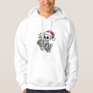 Sudadera Esqueleto sosteniendo bebida de matcha con sombrer