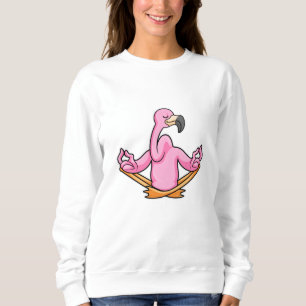 Sudadera Flamingo en el yoga en las piernas cruzadas