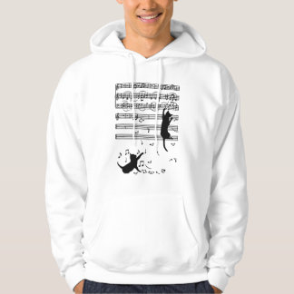 Sudadera Gato negro divertido escalando partitura musical
