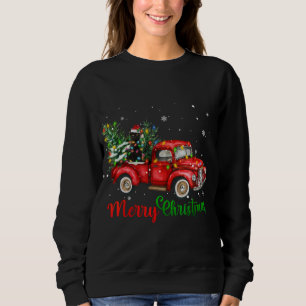 Sudadera Gracioso gato negro montando camioneta roja árbol
