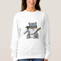 Hámster como Ninja en artes marciales con espada