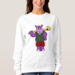 Sudadera Híppo en el hockey con bate de hockey