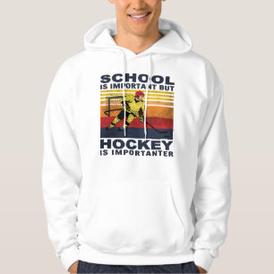 Sudadera Hockey Piernas encerradas, es un juego de hockey d