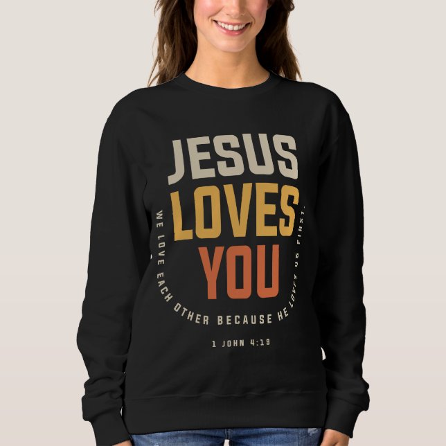 Sudadera Jesús te ama - 1 Juan 4:19 Cristiano (Anverso)