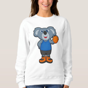 Sudadera Koala como jugador de baloncesto con baloncesto