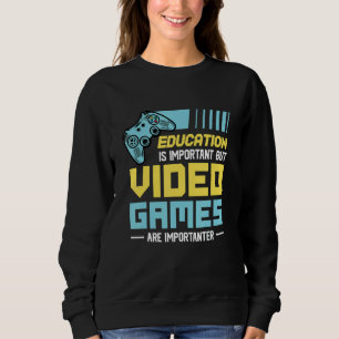 Sudadera La educación es importante, pero los videojuegos s
