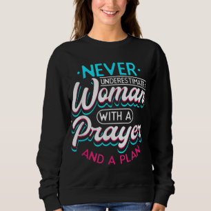 Sudadera La Fe Cristiana Nunca Subestima A Una Mujer Con Un