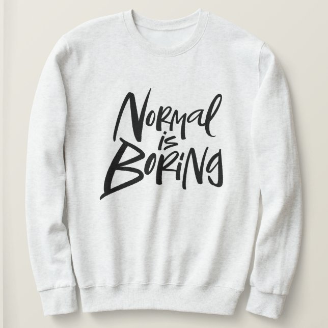 Sudadera La normalidad es aburrida la caligrafía negra (Anverso del diseño)