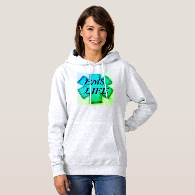 Sudadera La "vida de las mujeres en el SOMA" en verde azula (Anverso completo)