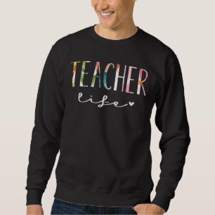 Sudadera La vida de un profesor con flores en el día del pr