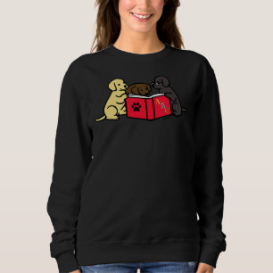 Sudadera Labrador Retriever cachorros leyendo libro