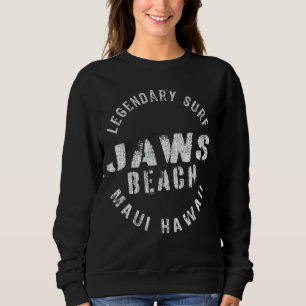 Sudadera Leyenda blanca en la llanura de la playa