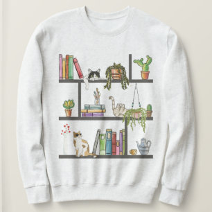 Sudadera Los gatos en una estantería, el gato y los libros