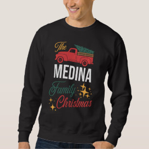 Sudadera Los Navidades de la familia Medina coincidiendo co