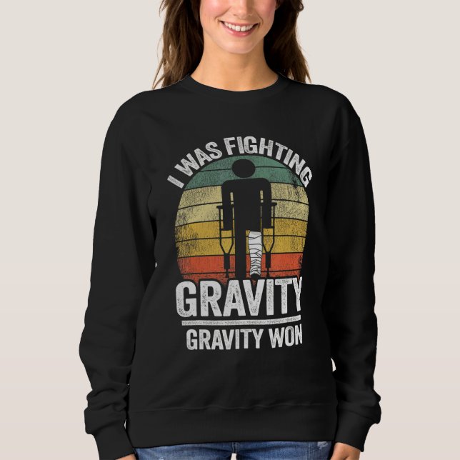 Sudadera Luchaba Contra Gravity Gravity Ganó Lesiones (Anverso)