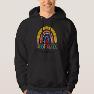 Sudadera Maestra de 1er grado enseña amor inspira arcoíris