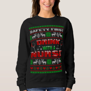 Sudadera Mantente seguro bebiendo con una enfermera navidad