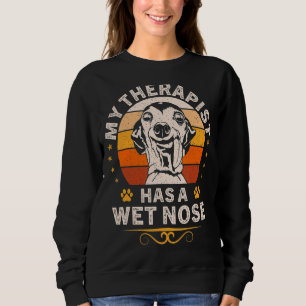 Sudadera Mi terapeuta tiene un perro con la nariz húmeda, u