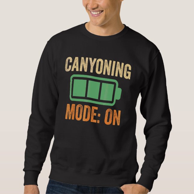Sudadera Modo de Canyoning en Diseño de Batería (Anverso)