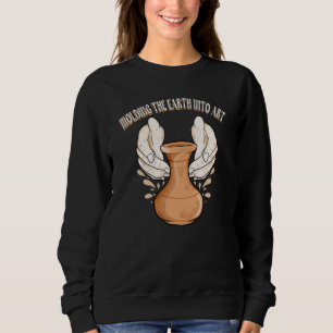 Sudadera Moldeando la Tierra en arcilla para escultura de a