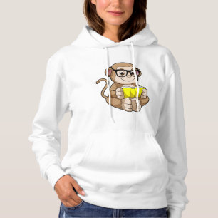 Sudadera Mono como estudiante con anteojos y libro