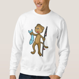 Sudadera Mono en la pesca con caña y pescado