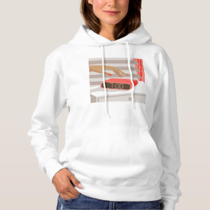 Sudadera Mujeres presionando con la mano el botón de snooze