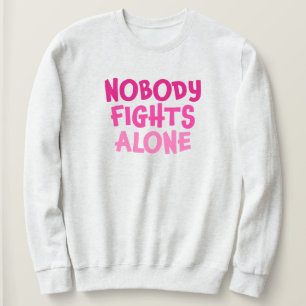 Sudadera Nadie lucha solo contra el rosa