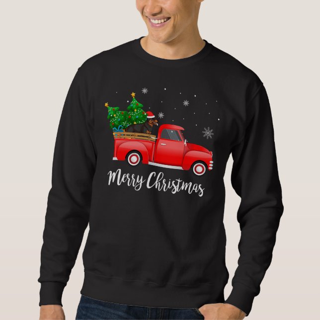 Sudadera Navidades de camionetas rottweiler (Anverso)