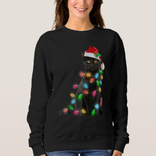 Sudadera Navidades de gato negro encienden a curioso gato q