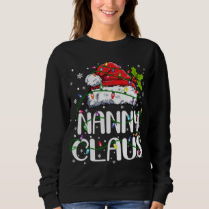 Sudadera Navidades de Nanny Claus iluminan la casa de parej