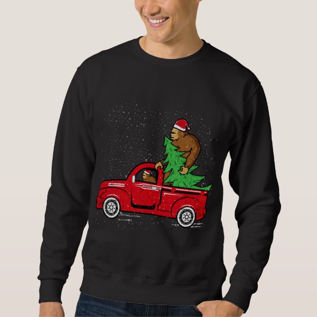 Sudadera Navidades de Santa Bigfoot Riding Red Truck Sasqua (Anverso)