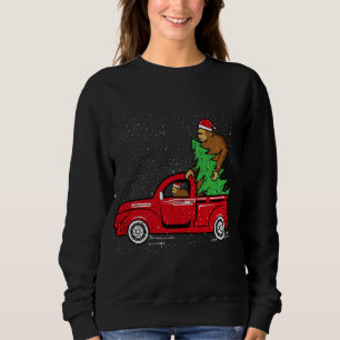 Sudadera Navidades de Santa Bigfoot Riding Red Truck Sasqua