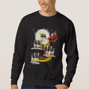 Sudadera Navidades de Santa Claus viajando en bote lechero