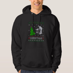 Sudadera Navidades feos sudan al iluminar el árbol de navid