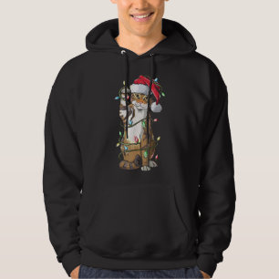 Sudadera Navidades Gorras del gato Santa Claus alumbran a c