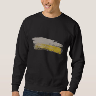 Sudadera negra y dorada