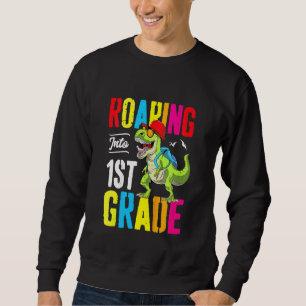 Sudadera Niños lanzando mochila de dinosaurio de primer gra
