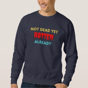 Sudadera No está muerto aún podrido