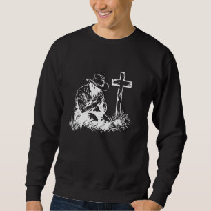 Sudadera Orando Cowboy arrodillándose a través de la Biblia