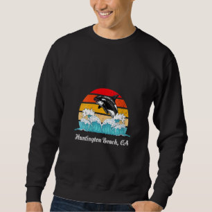 Sudadera Orca alterada en la playa de Huntington Beach