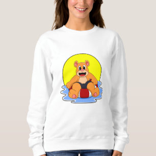 Sudadera Oso al nadar con anillo de natación