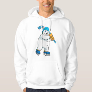 Sudadera Oso polar en hockey sobre hielo con bastón de hock