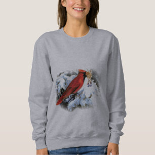 Sudadera pájaro rojo en nieve