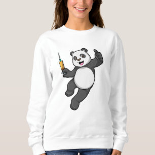 Sudadera Panda en la vacunación con jeringas