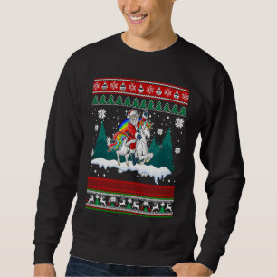 Sudadera Papá Noel montando unicornio arcoíris Navidad niño