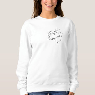 Sudadera pepino en mano, más pequeño.