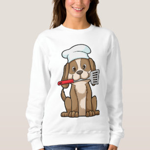 Sudadera Perro cocinado con el gorra y la espátula del chef