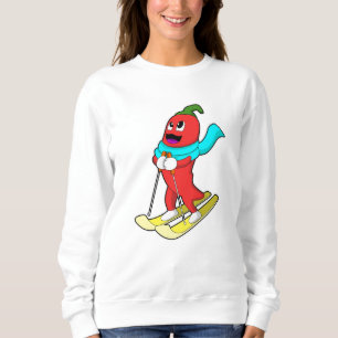 Sudadera Pimienta como esquiador con esquíes