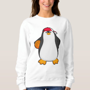 Sudadera Pingüino como jugador de baloncesto con baloncesto